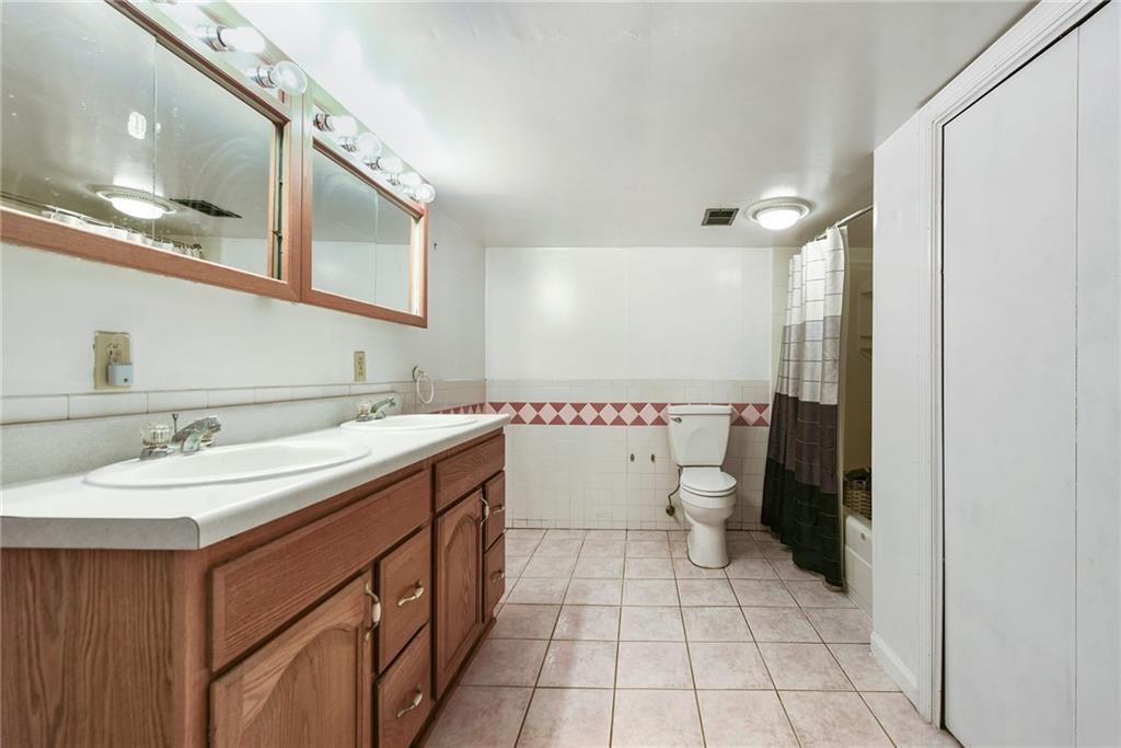 3330 Overland Drive Irwin, PA 15642 - Photo 34 of 44 a bathroom with a sink toilet and a mirror