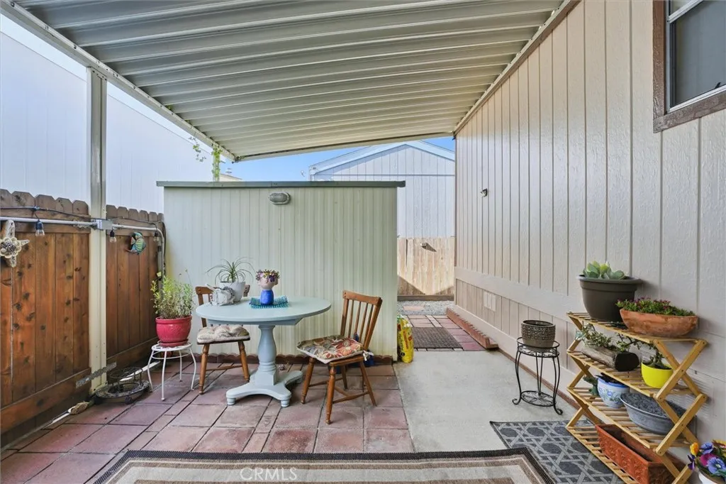 500 Atascadero, Unit D8 Morro Bay, CA 93442 - Photo 4 of 26 a backyard of a house with outdoor seating