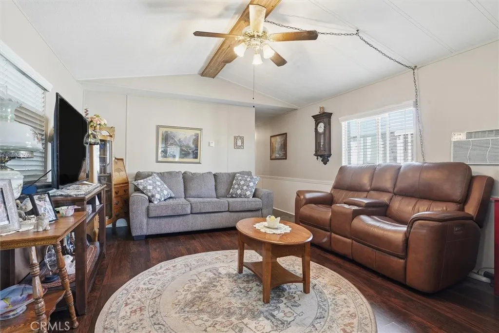 500 Atascadero, Unit D8 Morro Bay, CA 93442 - Photo 7 of 26 a living room with furniture and a flat screen tv