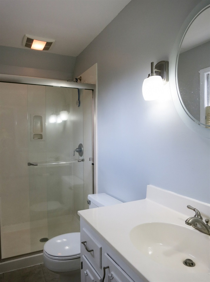 4101 Redington Drive Raleigh, NC 27609 - Photo 19 of 30 Master Bath w/tiled flr & lg cultured marble shower w/seat. Master Bath/Spa