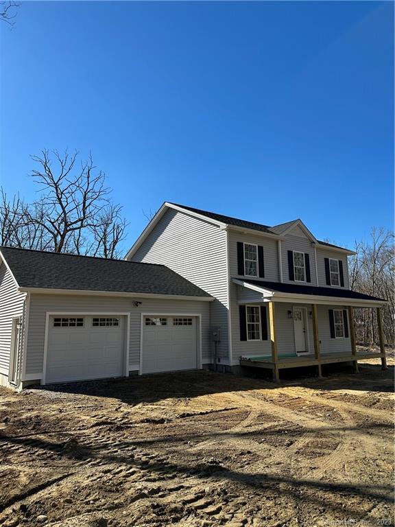 247 Tatnic Road Brooklyn, CT 06234 - Photo 1 of 1 a front view of a house