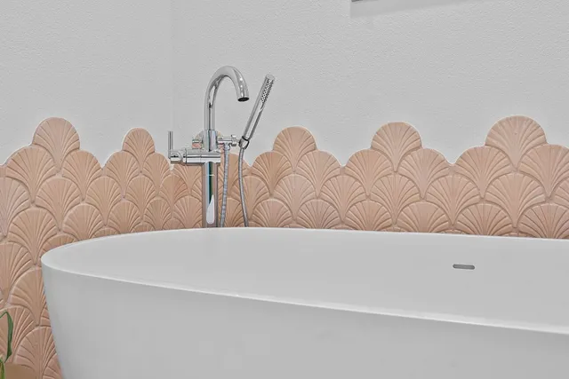 a bathroom with a bathtub