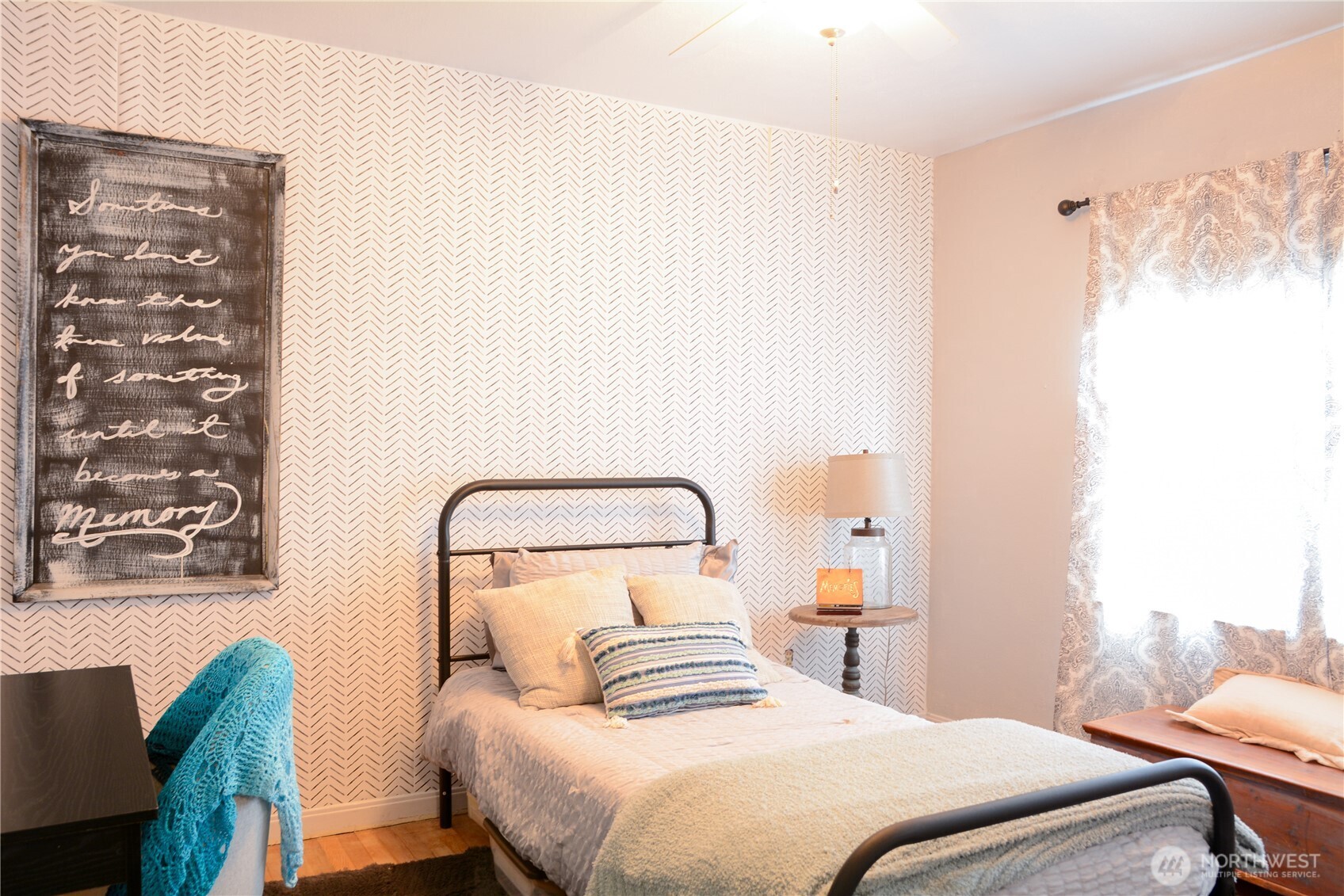 207 West 10th Avenue Ritzville, WA 99169 - Photo 19 of 36 a bedroom with a bed and a mirror