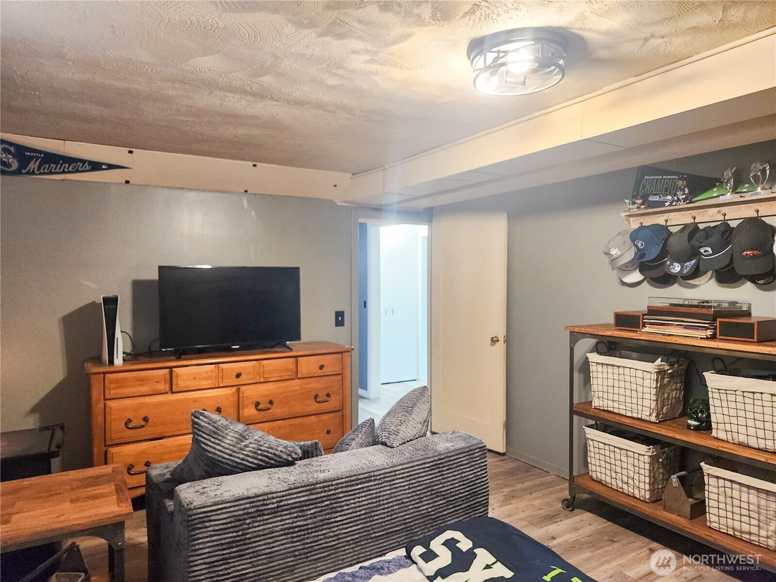 207 West 10th Avenue Ritzville, WA 99169 - Photo 23 of 36 a living room with furniture and a flat screen tv