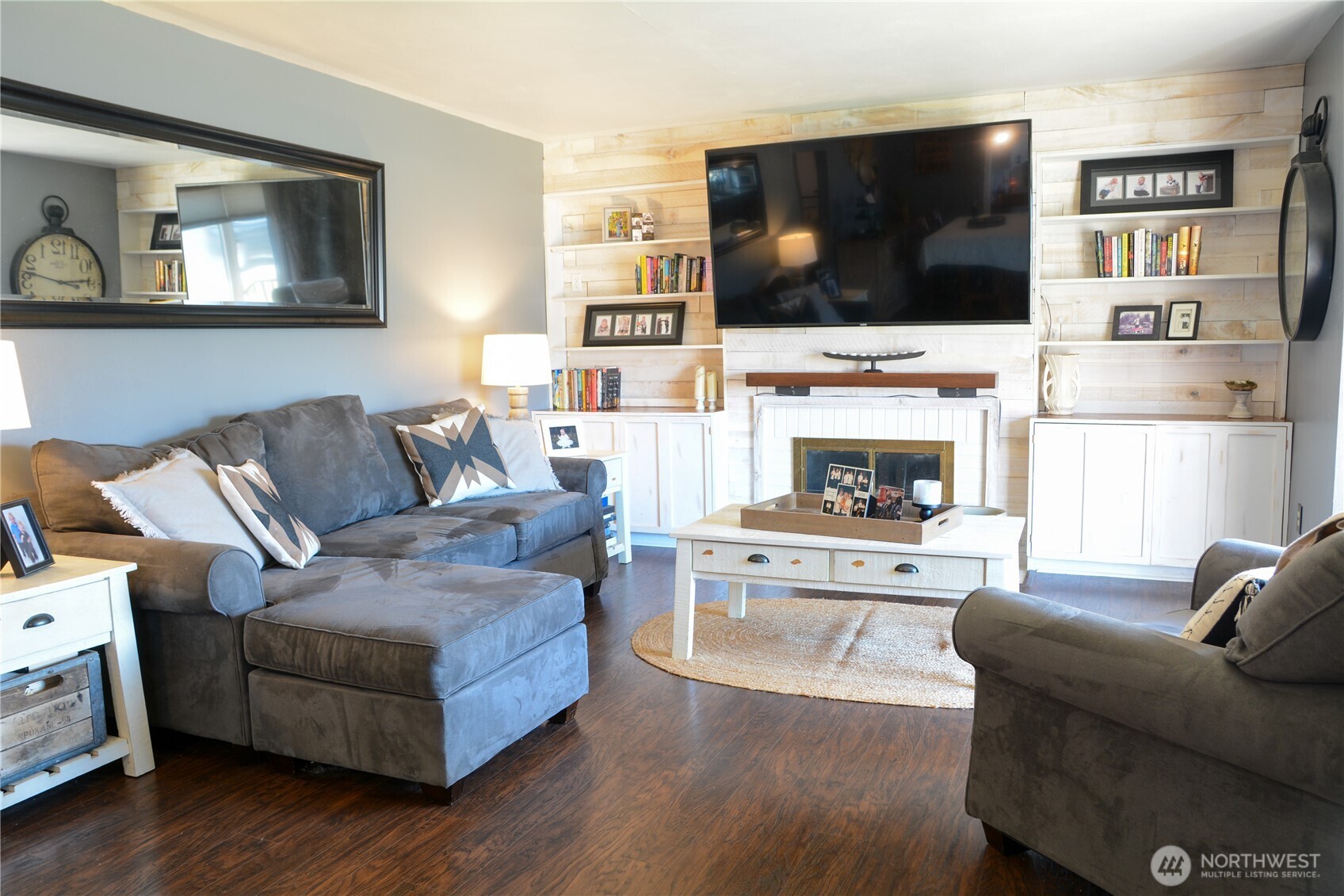 207 West 10th Avenue Ritzville, WA 99169 - Photo 3 of 36 a living room with fireplace furniture and a flat screen tv