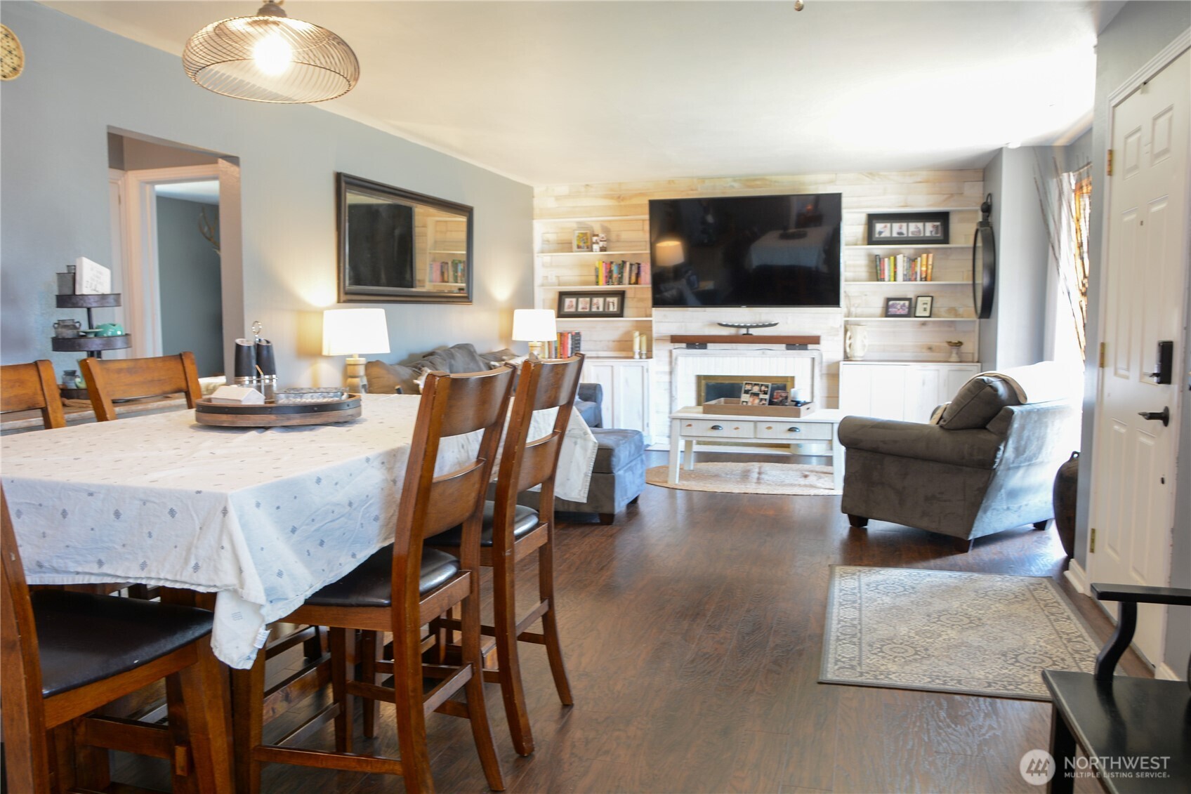 207 West 10th Avenue Ritzville, WA 99169 - Photo 6 of 36 a living room with furniture and a flat screen tv