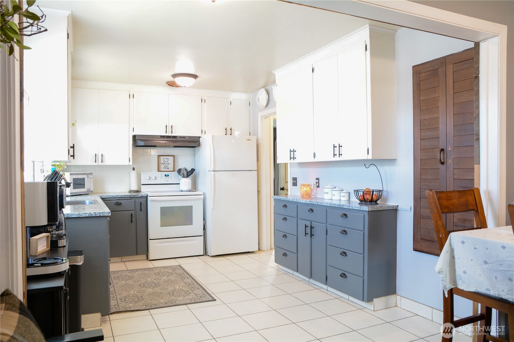 207 West 10th Avenue Ritzville, WA 99169 - Photo 7 of 36 a kitchen with cabinets appliances and furniture