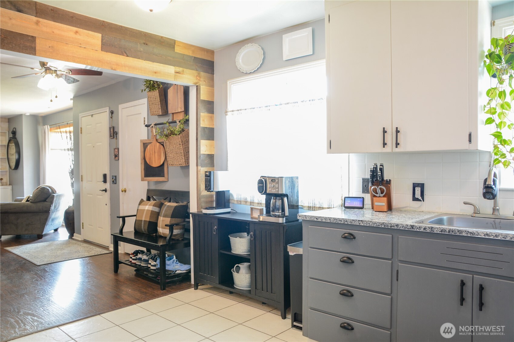 207 West 10th Avenue Ritzville, WA 99169 - Photo 10 of 36 a kitchen with cabinets appliances and a counter top space