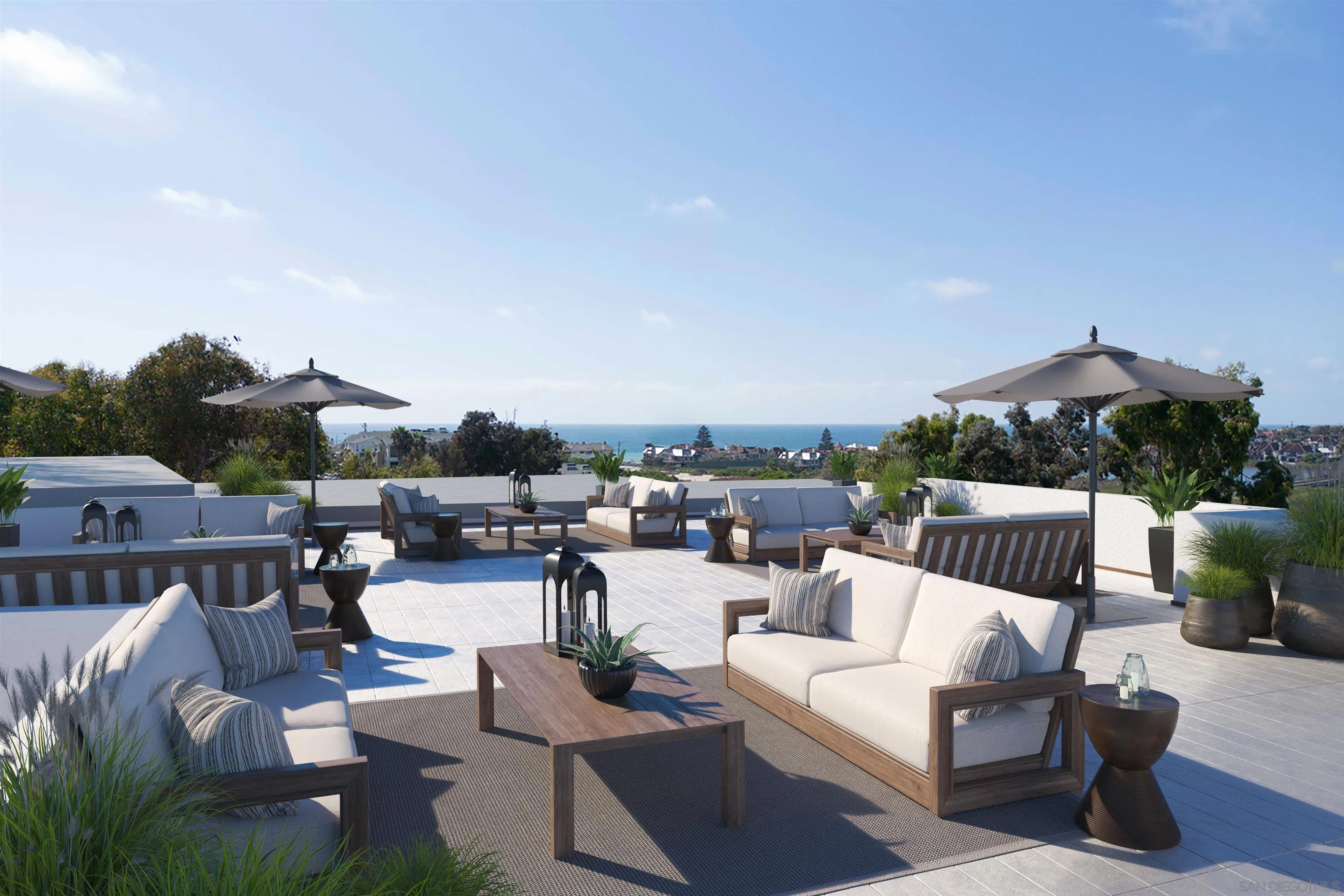 2501 State Street, Unit 202 Carlsbad, CA 92008 - Photo 13 of 15 a view of a patio with couches and a table and chairs with wooden floor