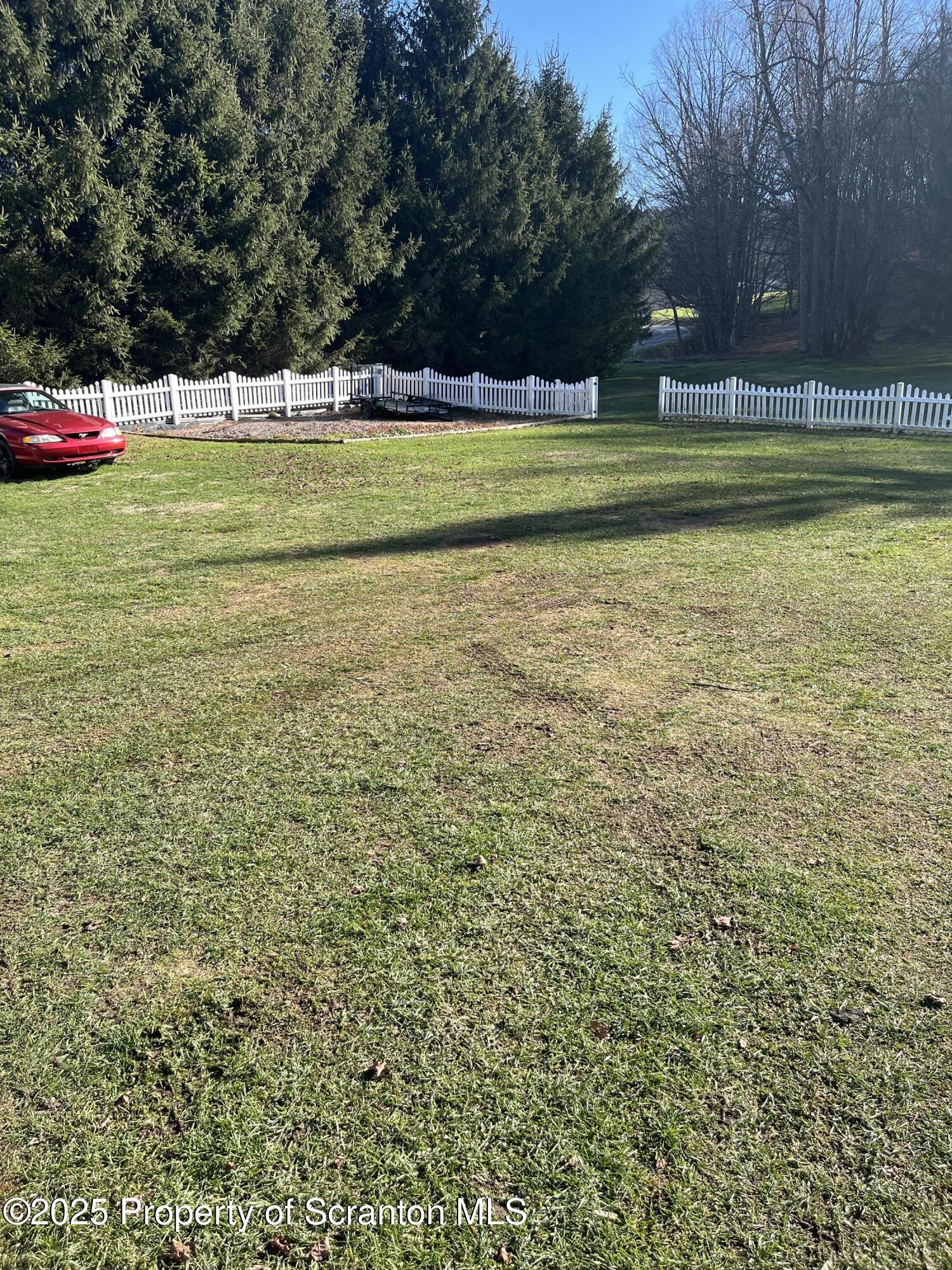 6666 Tingley Lake Road New Milford, PA 18834 - Photo 14 of 45 a view of a green field