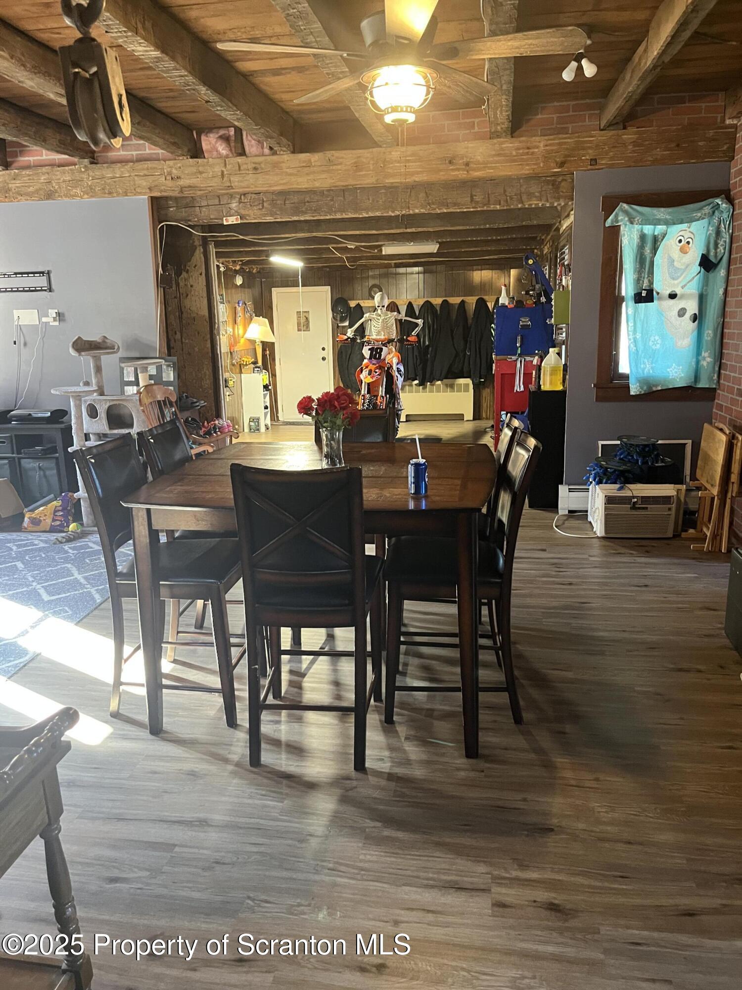 6666 Tingley Lake Road New Milford, PA 18834 - Photo 24 of 45 a view of a dining room with furniture