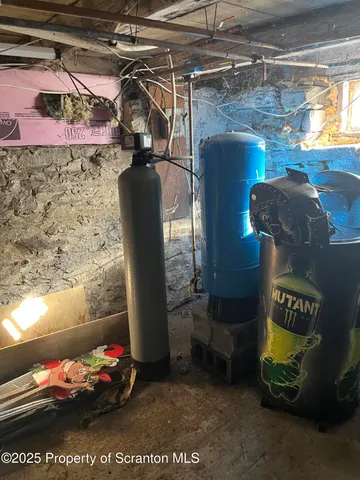 a room with furniture and a wooden floor