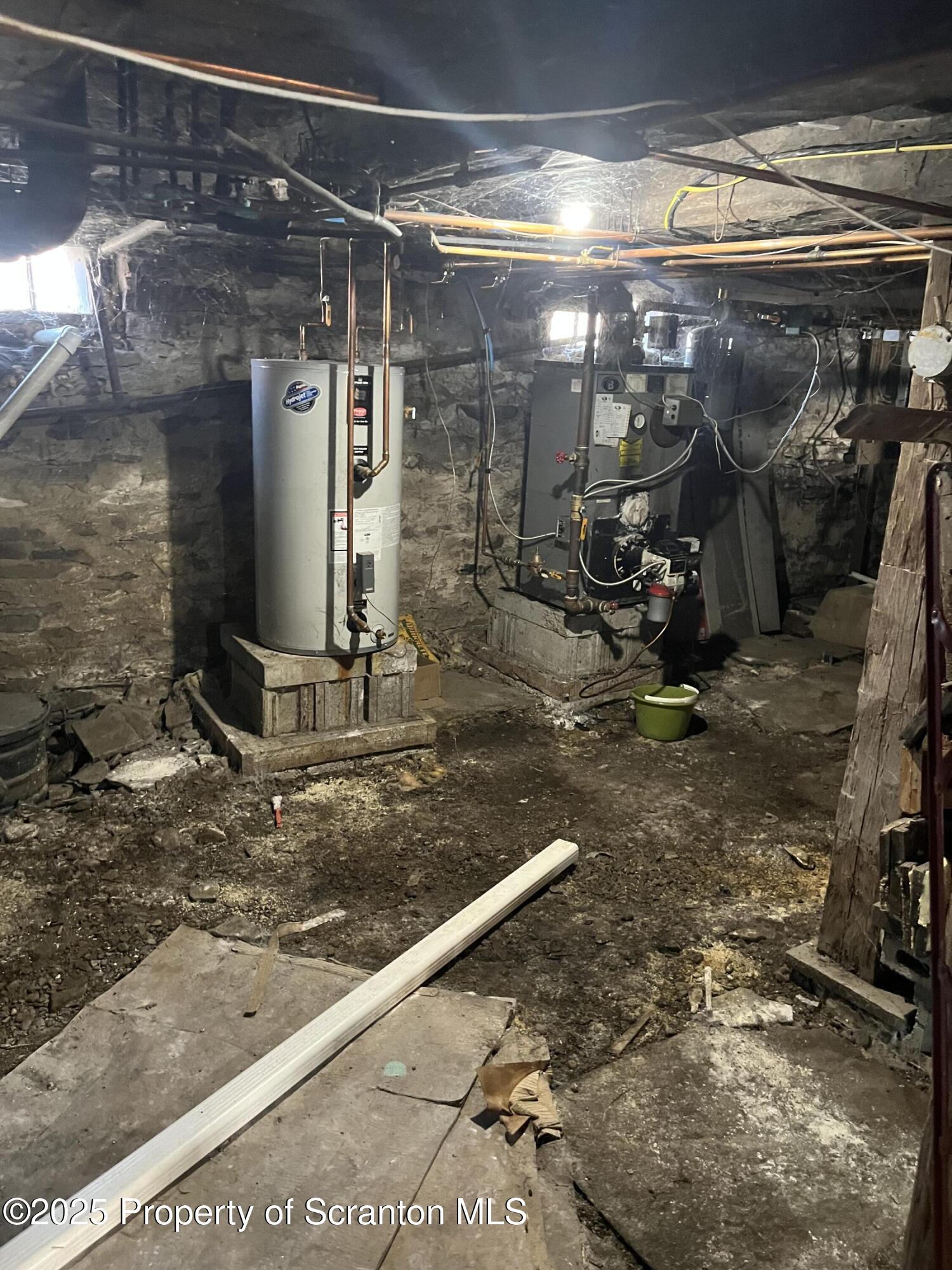 6666 Tingley Lake Road New Milford, PA 18834 - Photo 42 of 45 a view of a room with water heater