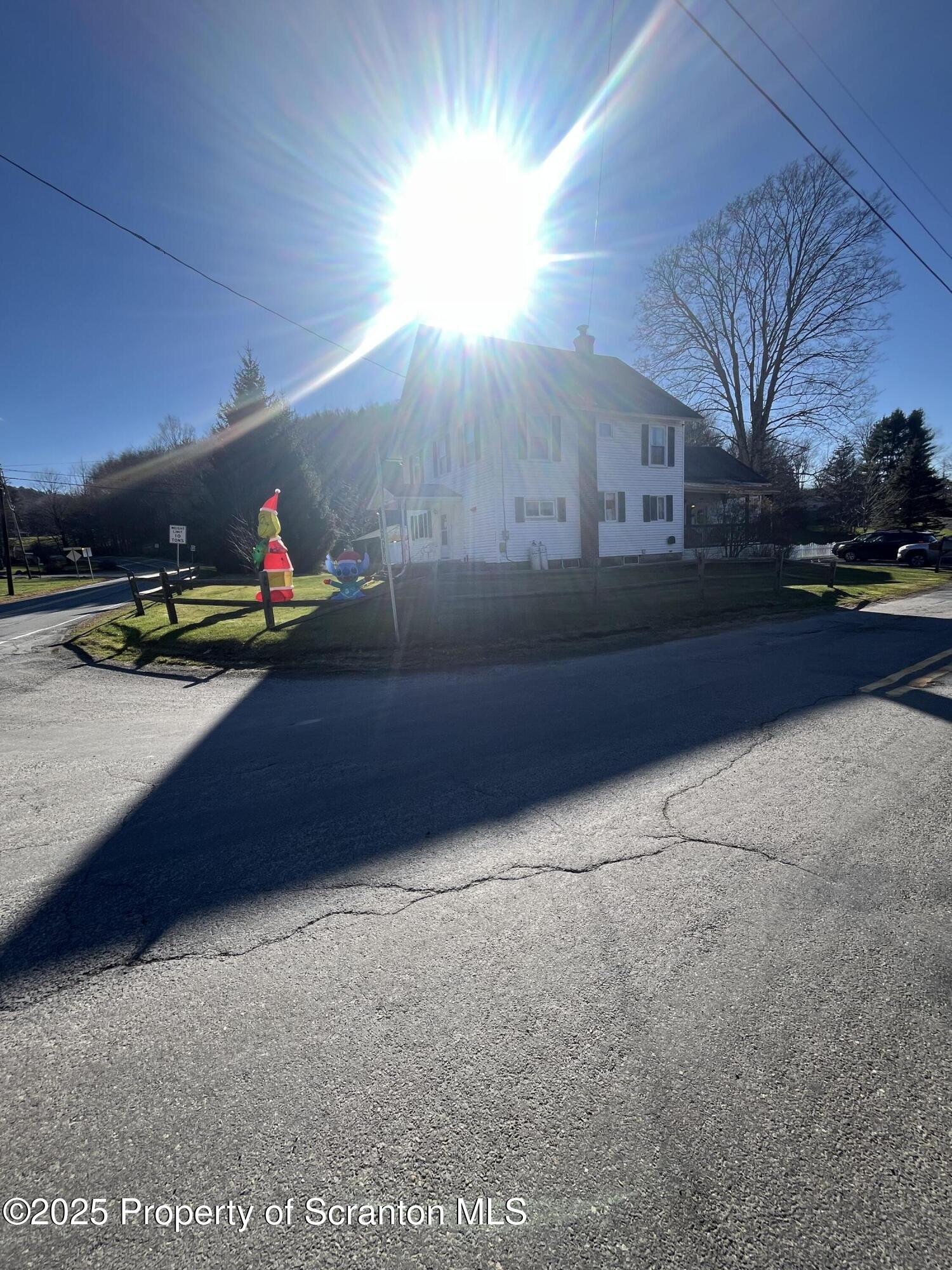 6666 Tingley Lake Road New Milford, PA 18834 - Photo 6 of 45 a living room with furniture