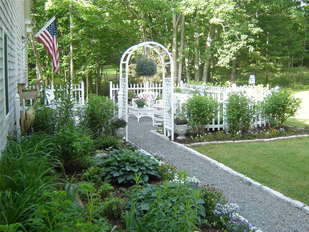33 Bridge Road Brooksville, ME 04617 - Photo 16 of 35 Walk way from garage to fenced in...