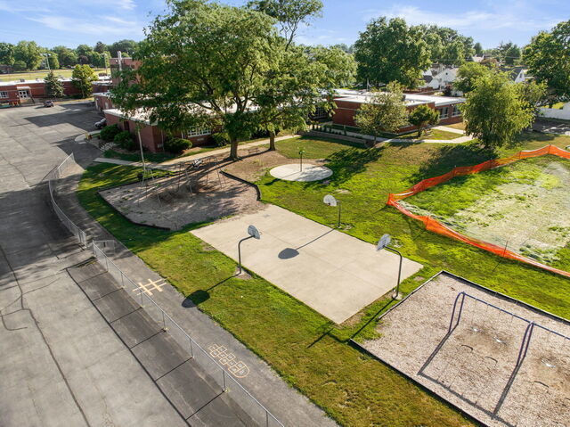 648 Penfield Street Beecher, IL 60401 - Photo 9 of 15 a view of a swimming pool with a patio