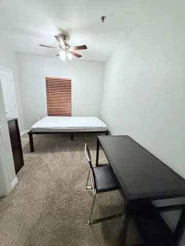 an empty room with a bench