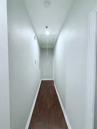 a workspace room with furniture