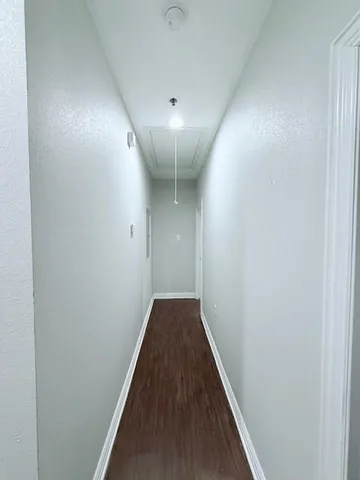 a workspace room with furniture