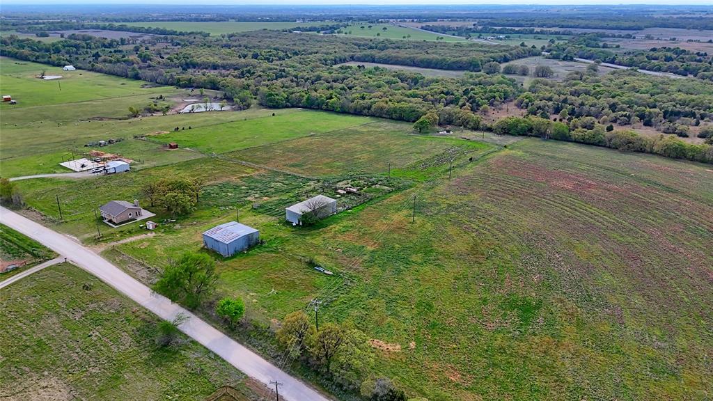 688 Alamo Road Montague, TX 76251 - Photo 13 of 35 an aerial view of a golf course with parking space