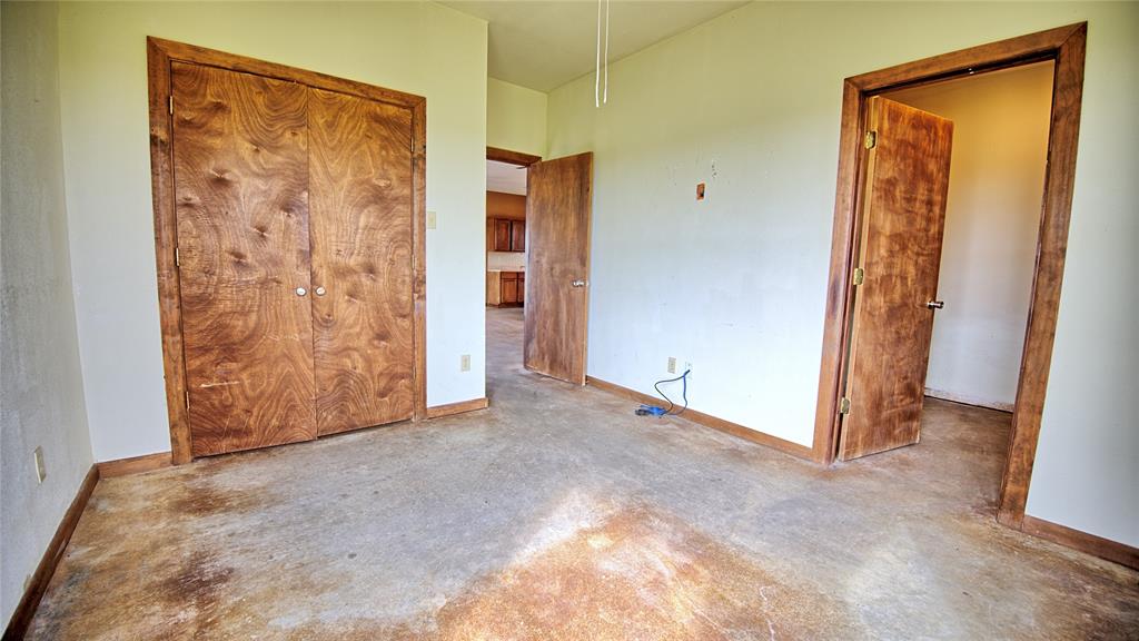 688 Alamo Road Montague, TX 76251 - Photo 14 of 35 an empty room with painted walls