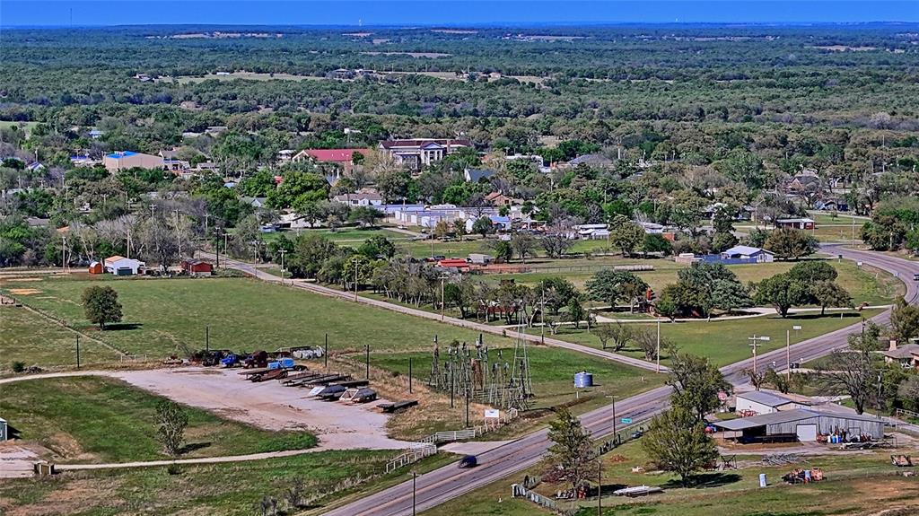 688 Alamo Road Montague, TX 76251 - Photo 8 of 35 an aerial view of a city with lots of residential buildings