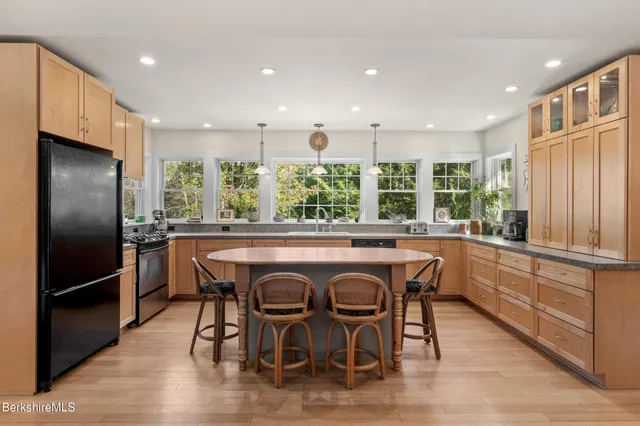 a view of a kitchen with furniture and a window