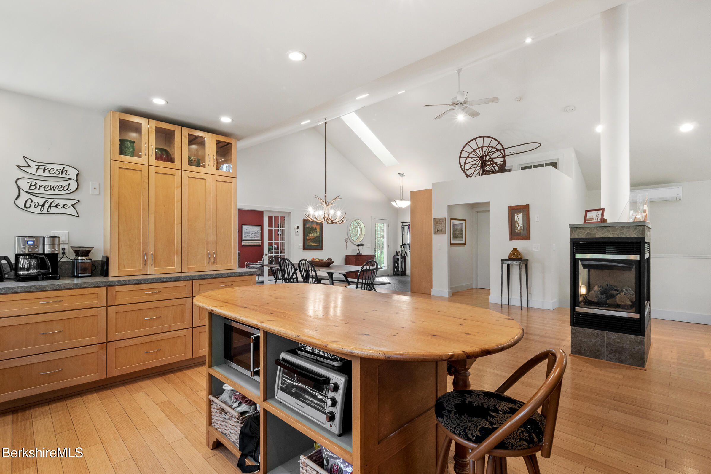 2017 Monterey Road Otis, MA 01255 - Photo 14 of 60 a kitchen with stainless steel appliances kitchen island granite countertop a stove a sink a refrigerator and chairs