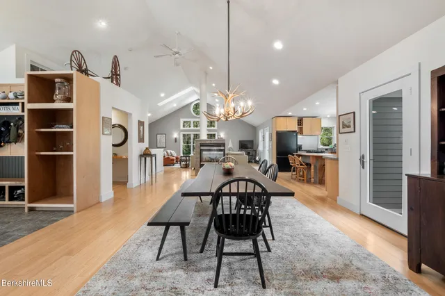 a bedroom with furniture and a rug