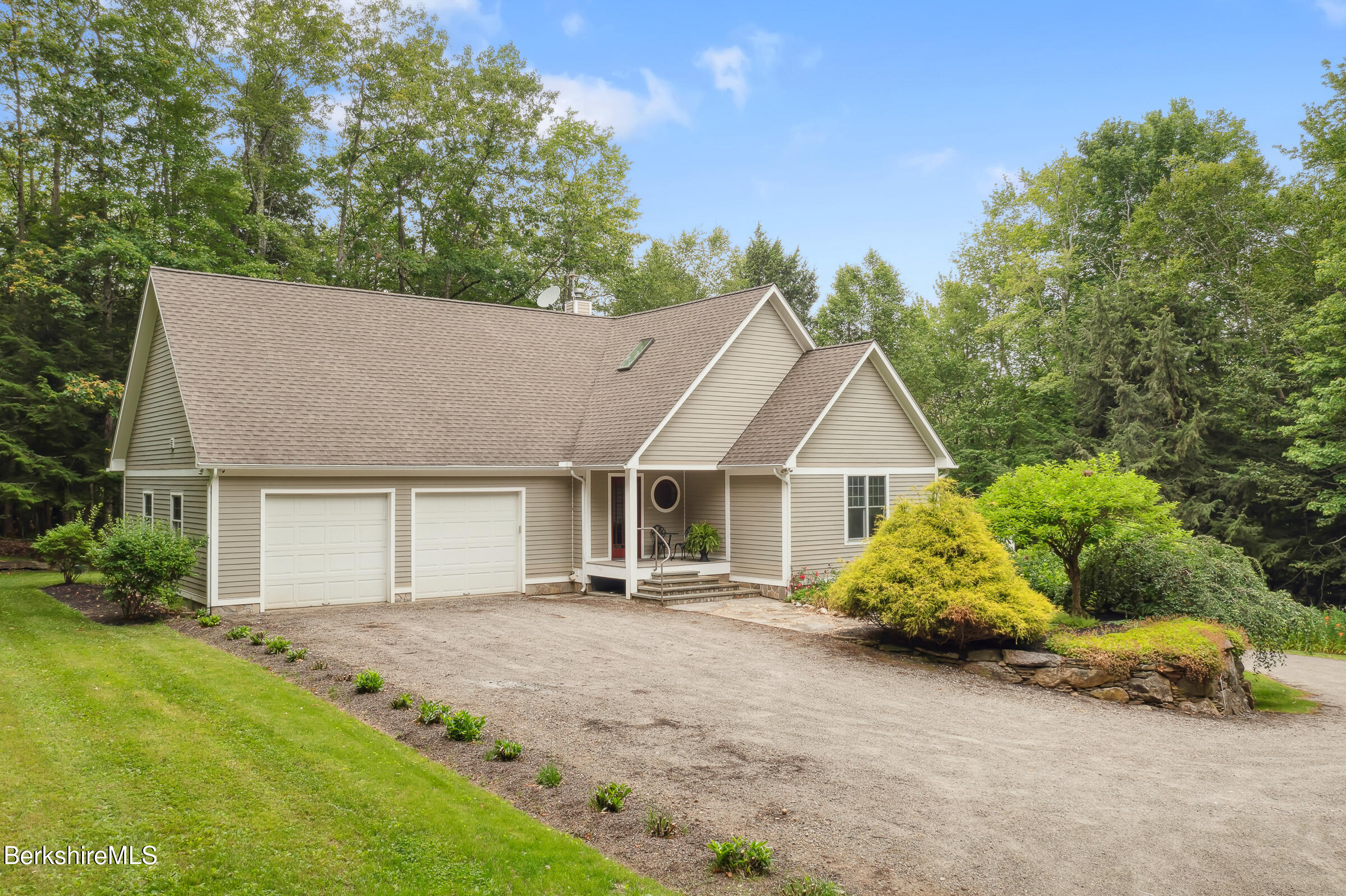 2017 Monterey Road Otis, MA 01255 - Photo 2 of 60 front view of a house with a yard