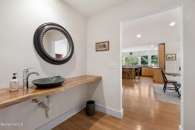 a view of a yard with large trees