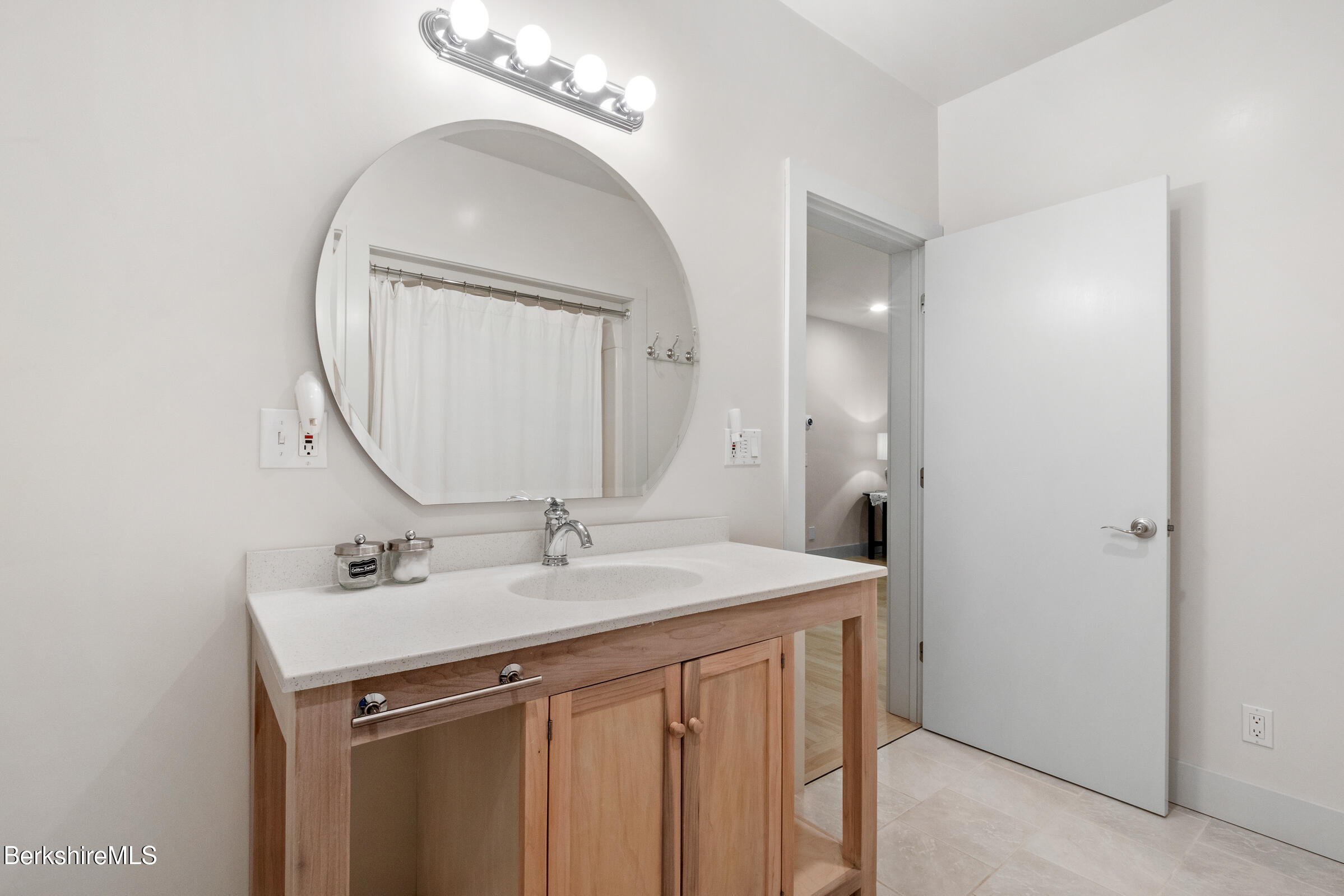 2017 Monterey Road Otis, MA 01255 - Photo 30 of 60 a bathroom with a sink vanity and a mirror