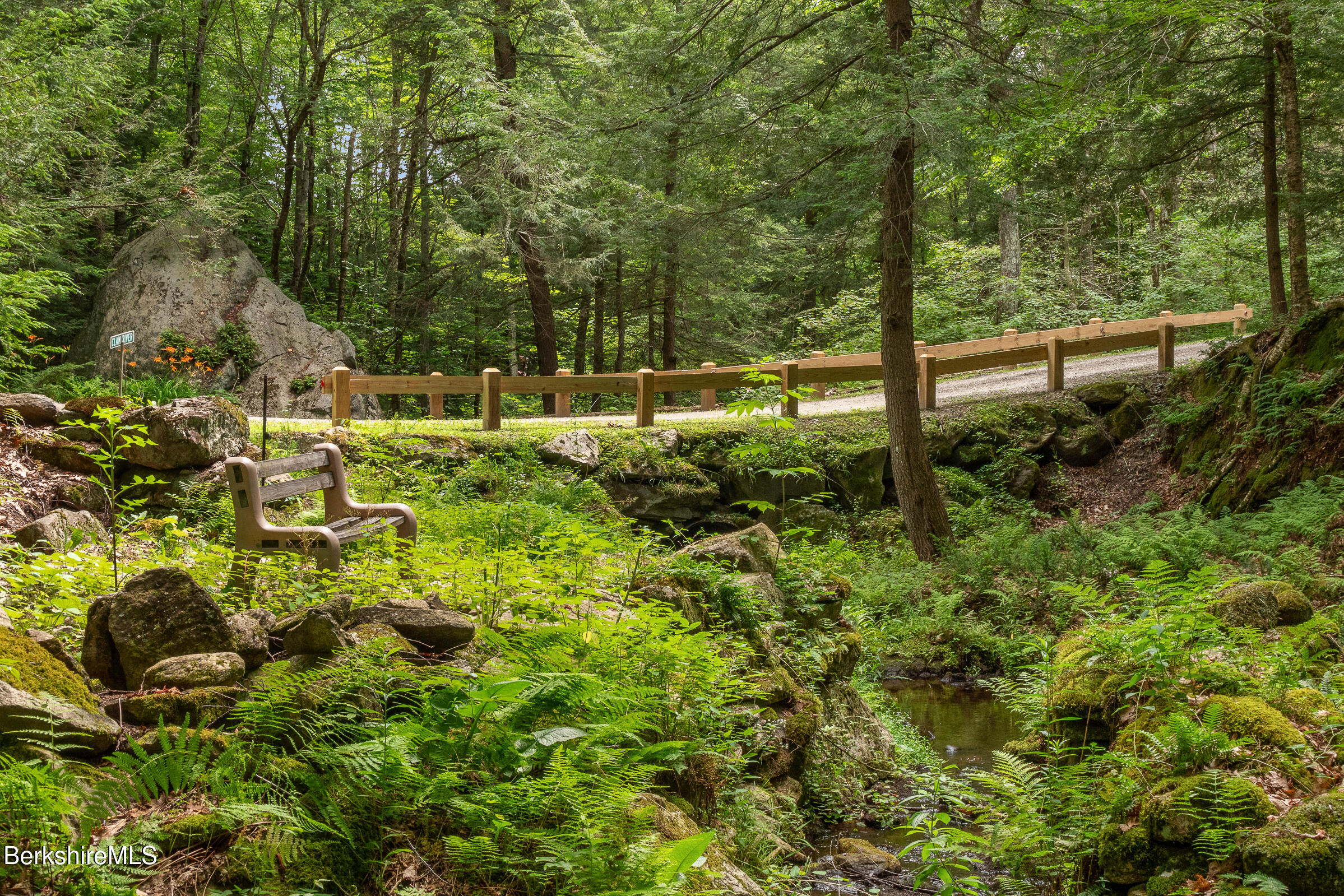 2017 Monterey Road Otis, MA 01255 - Photo 52 of 60 a view of a garden with a tree