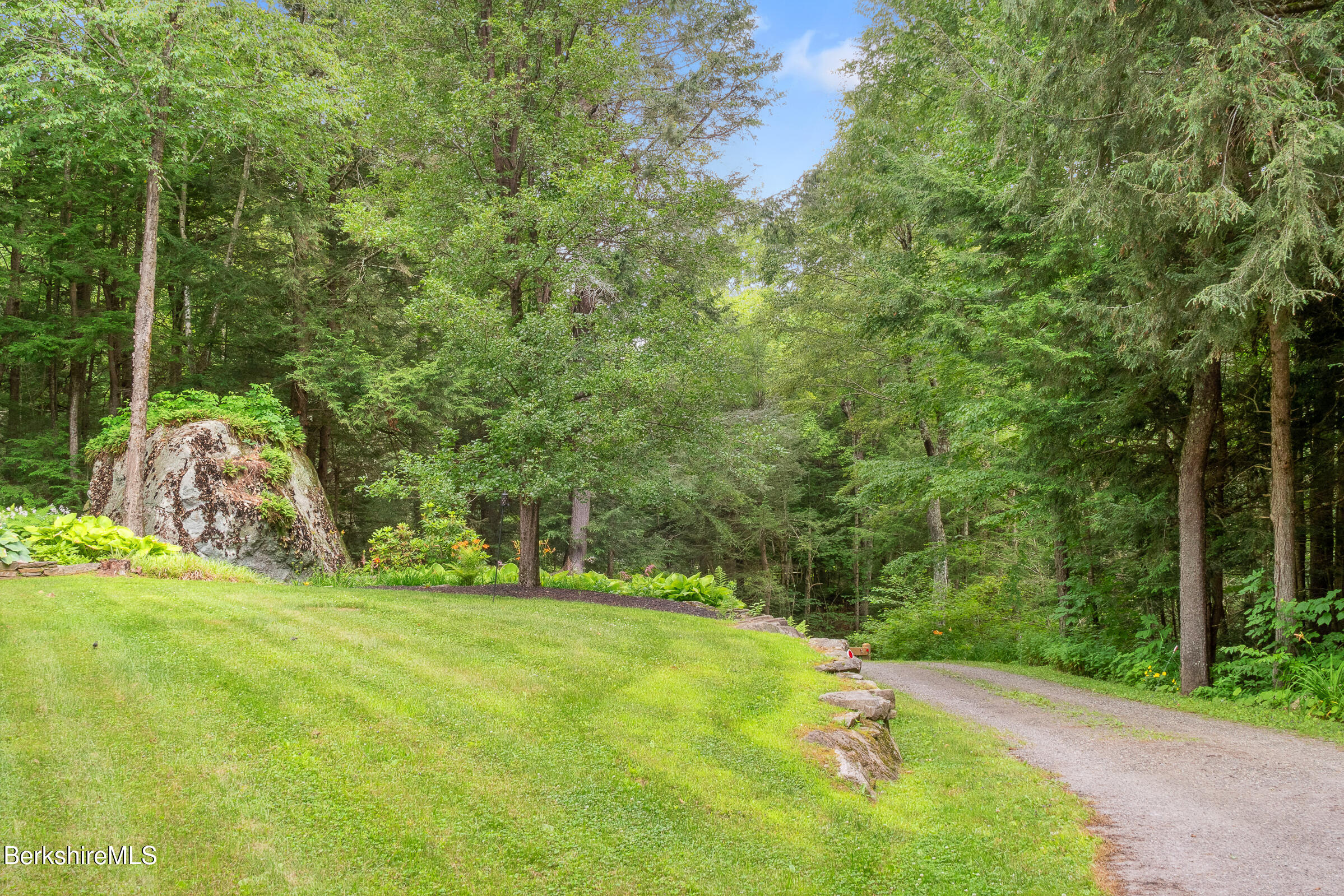 2017 Monterey Road Otis, MA 01255 - Photo 54 of 60 a backyard of a house with a yard and outdoor seating