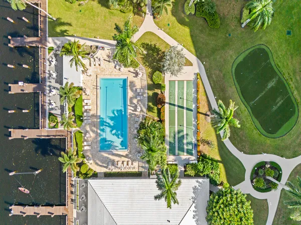 a view of a swimming pool with a garden
