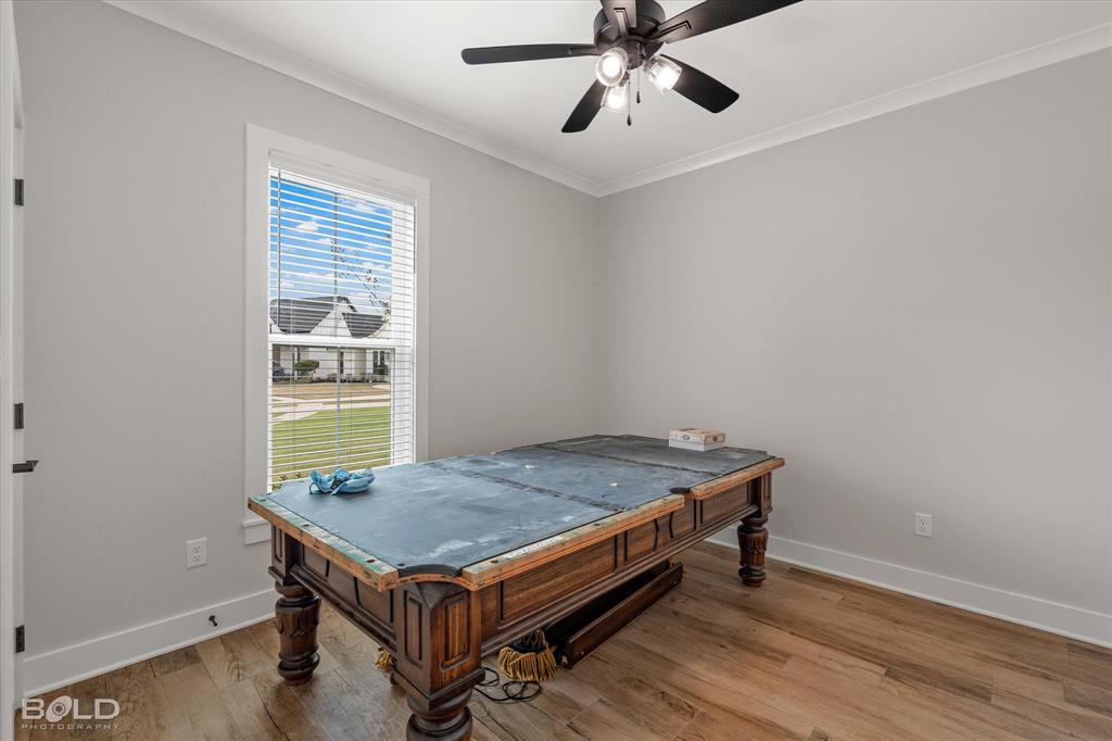 616 Meridian Way Benton, LA 71006 - Photo 29 of 40 a room with pool table and windows