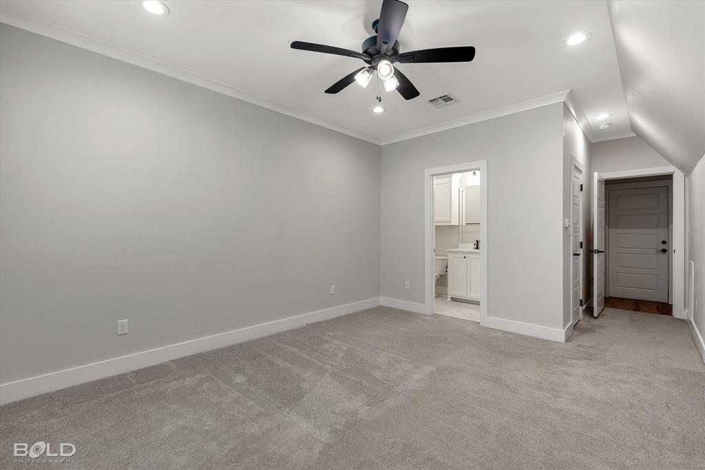 616 Meridian Way Benton, LA 71006 - Photo 31 of 40 an empty room with a ceiling fan and a window