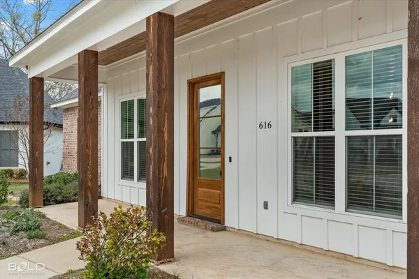 a view of front door and porch