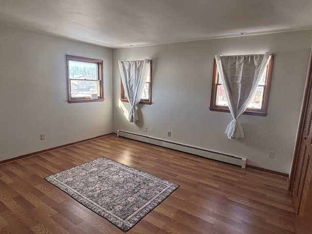 587 Phillips Circle Antioch, IL 60002 - Photo 8 of 20 a view of a room with wooden floor and window