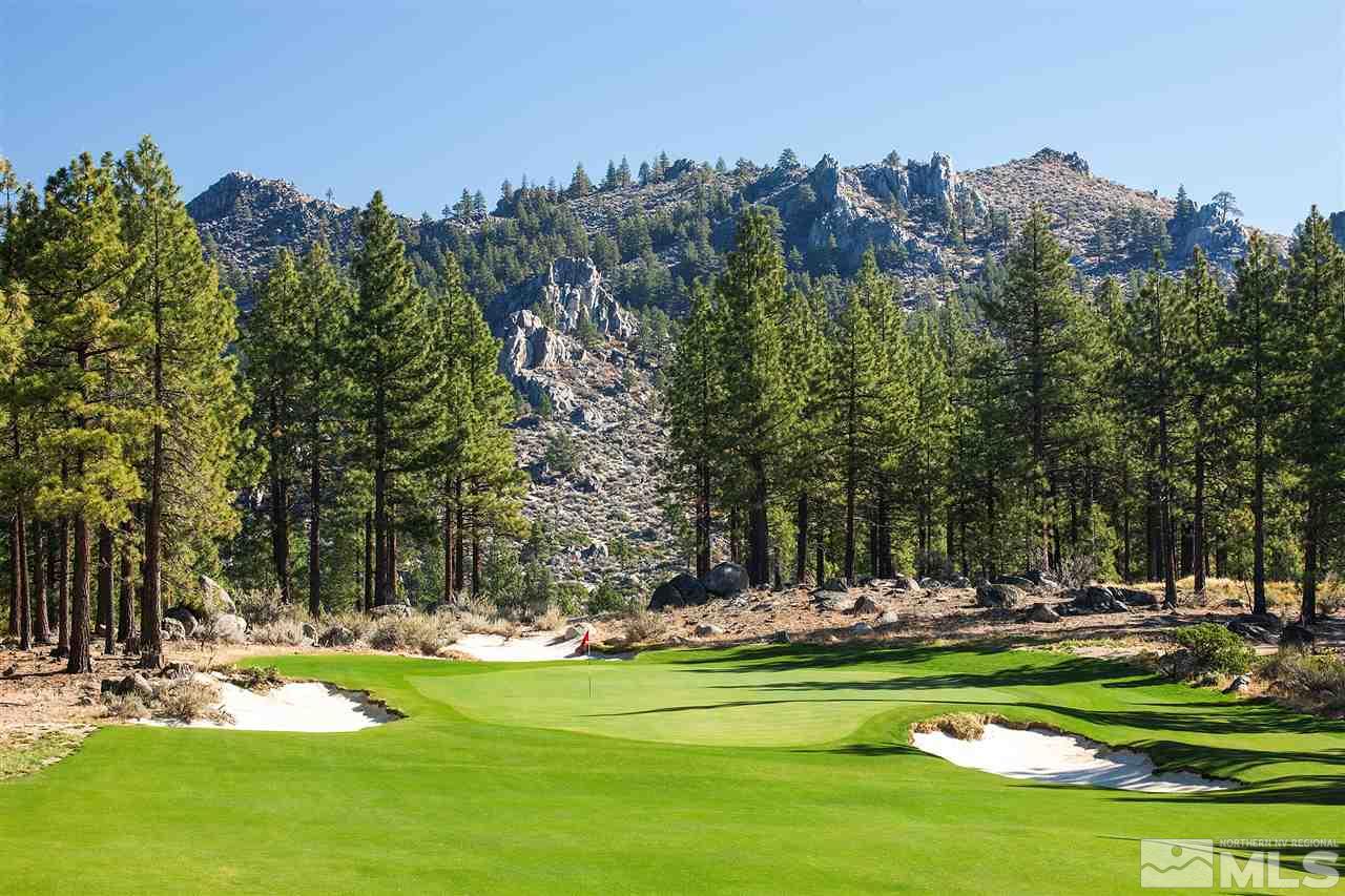 178 Tor Court, Unit 59 Carson City, NV 89705 - Photo 3 of 29 a view of a playground with lawn chairs and a couple of large trees