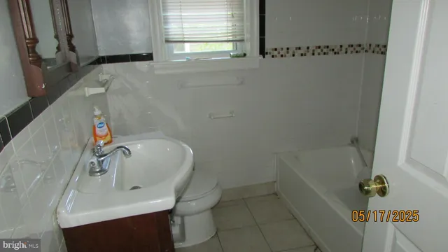 a bathroom with a sink and a bathtub