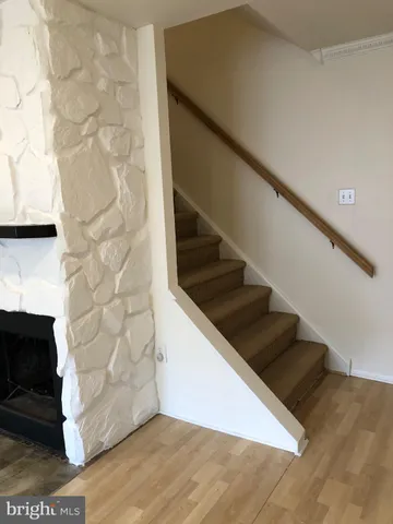 a view of entryway with wooden floor