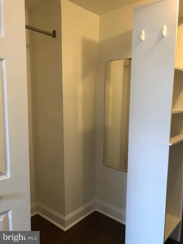 a bathroom with a shower and a sink