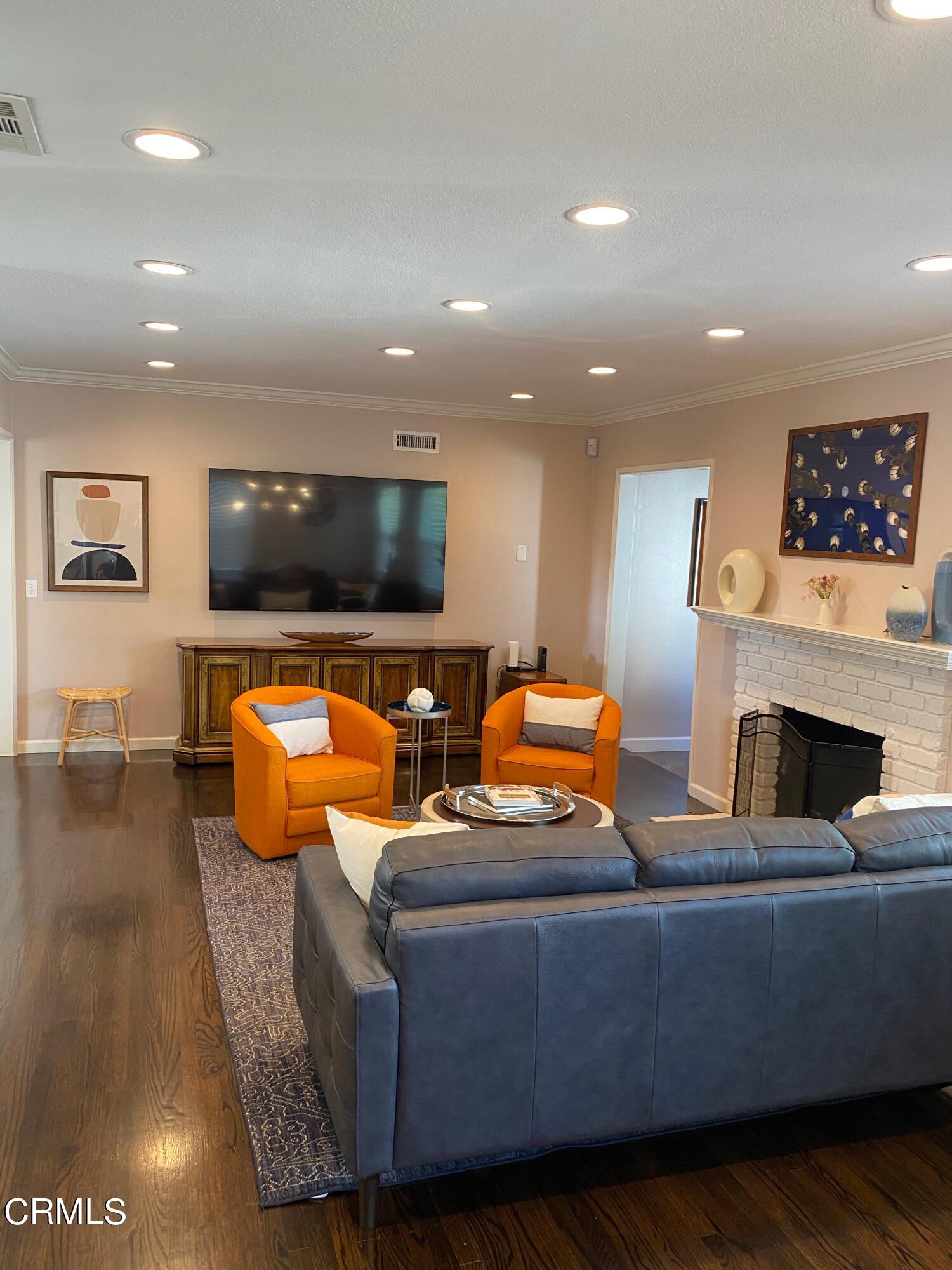 378 Grand Avenue Monrovia, CA 91016 - Photo 11 of 18 a living room with furniture and a flat screen tv