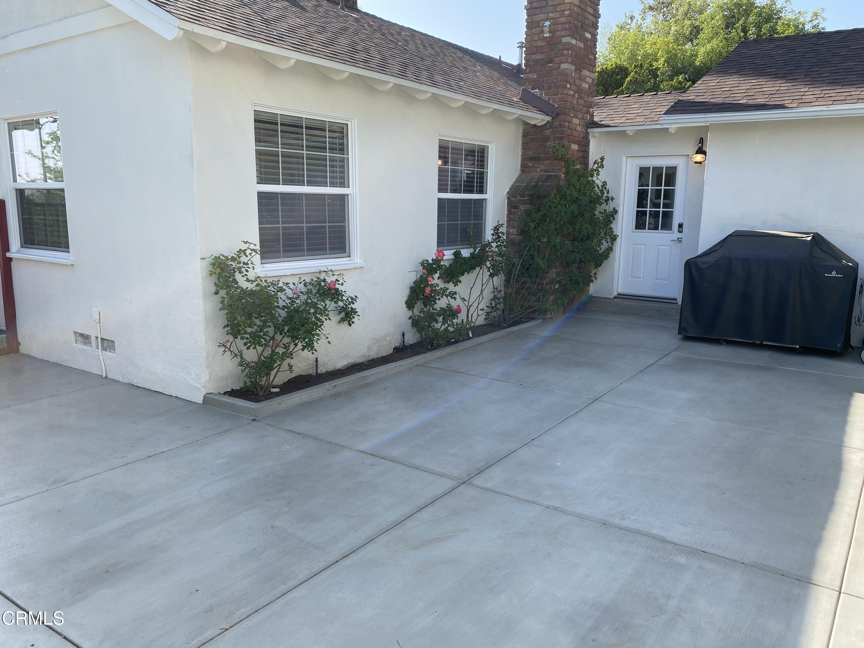 378 Grand Avenue Monrovia, CA 91016 - Photo 15 of 18 a couple of couches and a potted plant in front of a house