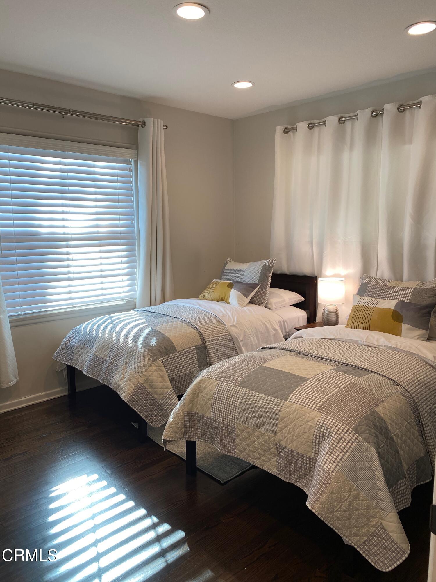 378 Grand Avenue Monrovia, CA 91016 - Photo 3 of 18 a bedroom with two beds and a window