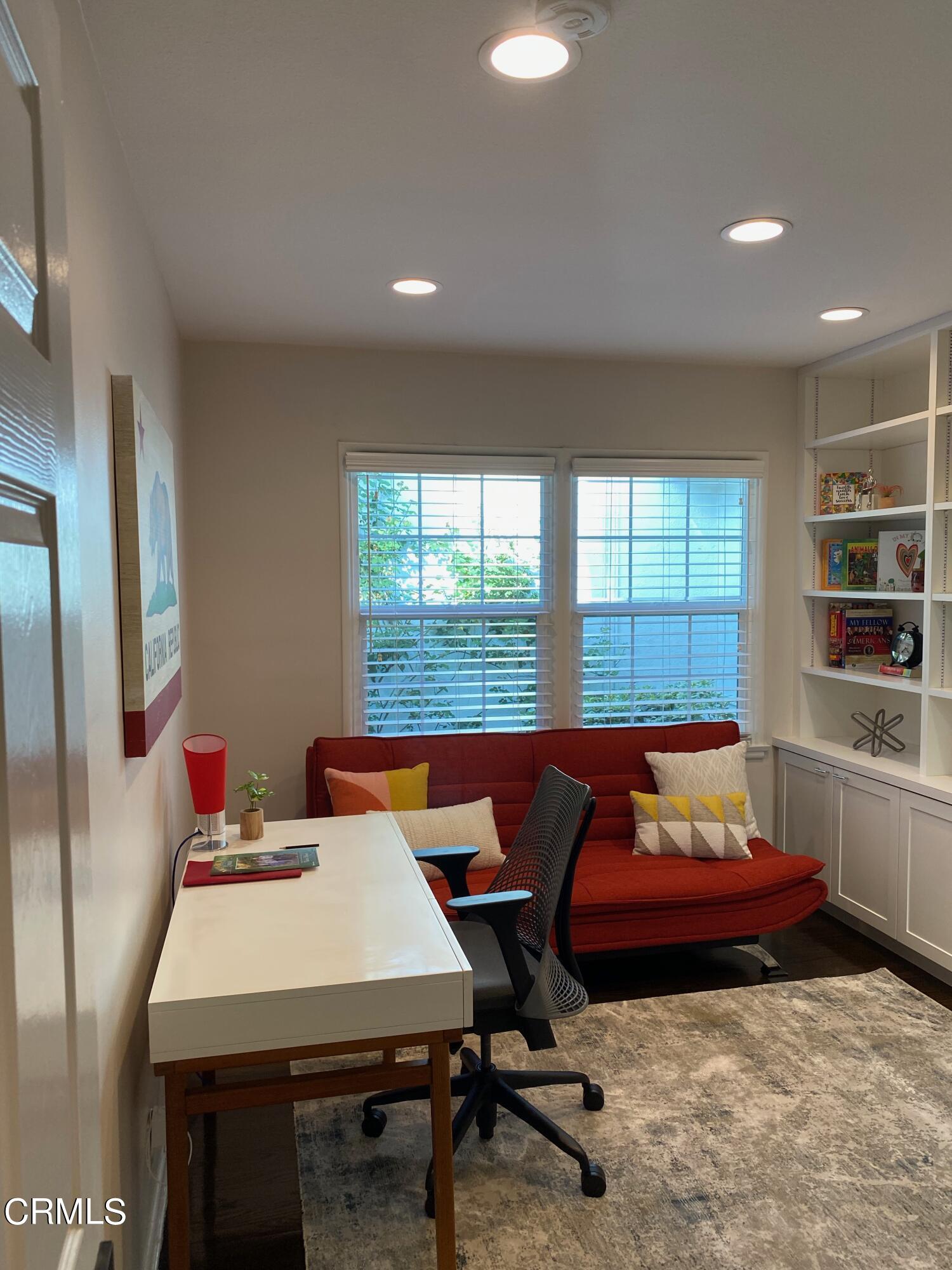 378 Grand Avenue Monrovia, CA 91016 - Photo 7 of 18 a living room with furniture a rug and a large window