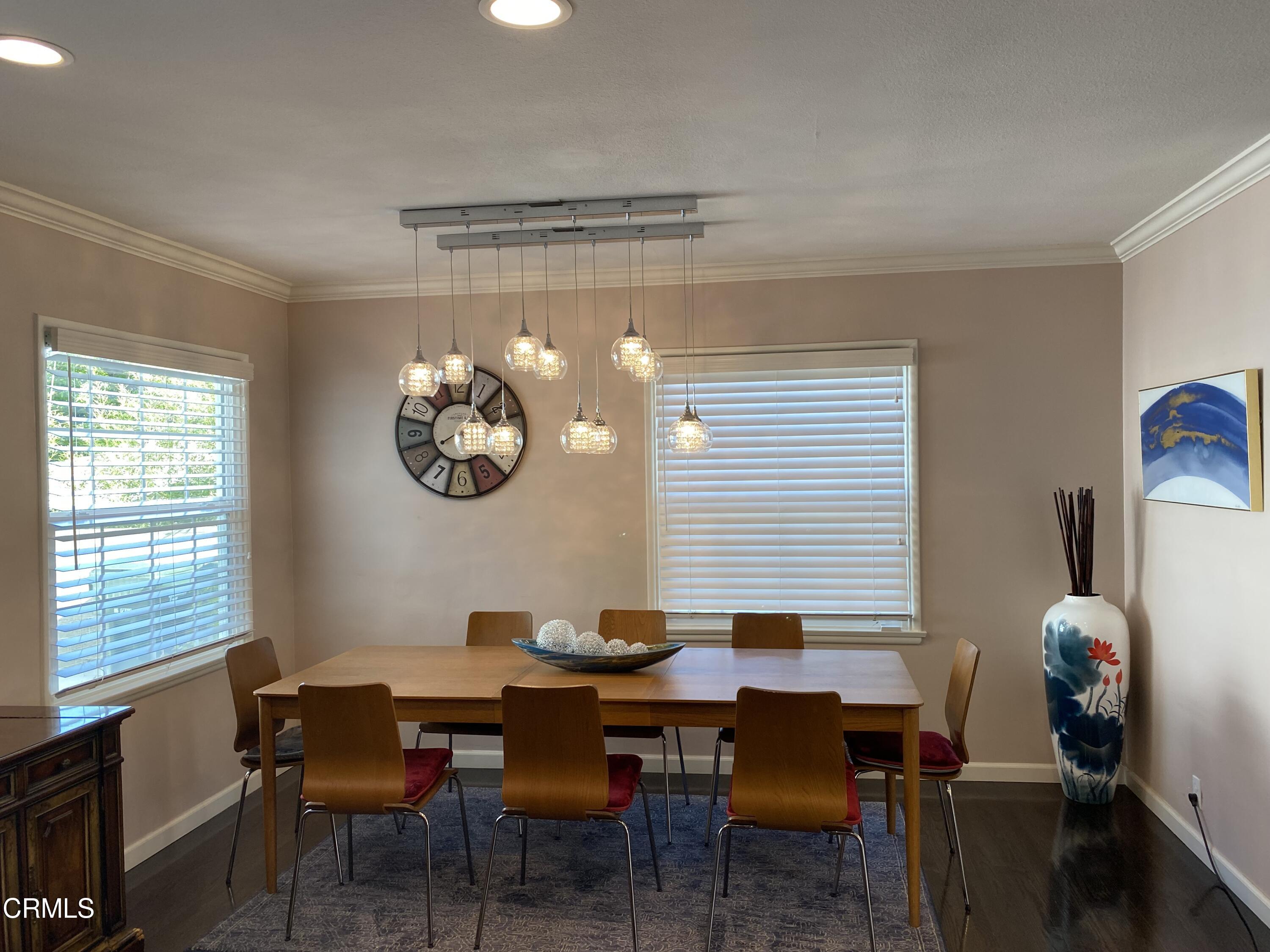 378 Grand Avenue Monrovia, CA 91016 - Photo 9 of 18 a dining room with a table and chairs