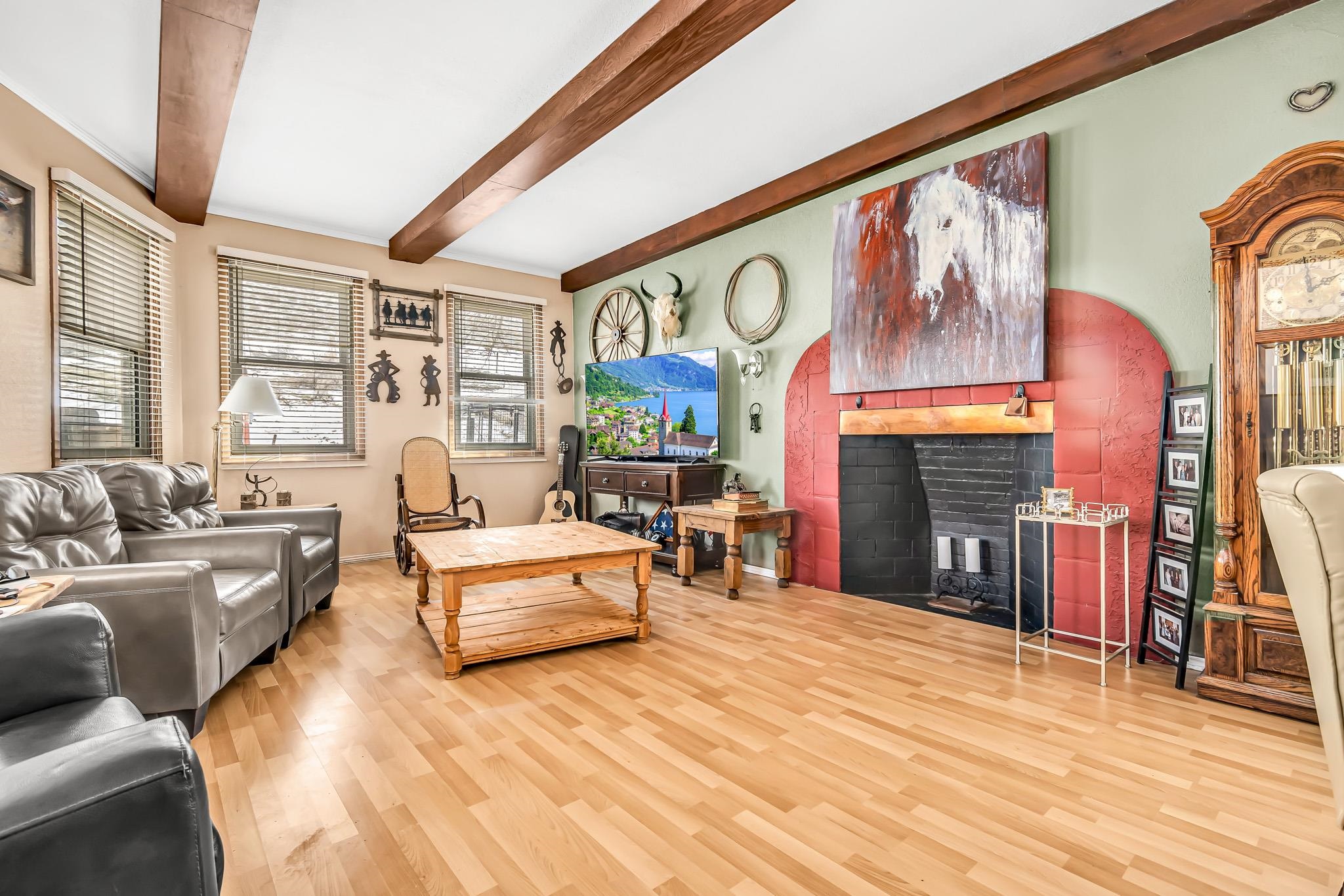 3553 1/2 E Road Palisade, CO 81526 - Photo 14 of 16 a living room with furniture and fireplace