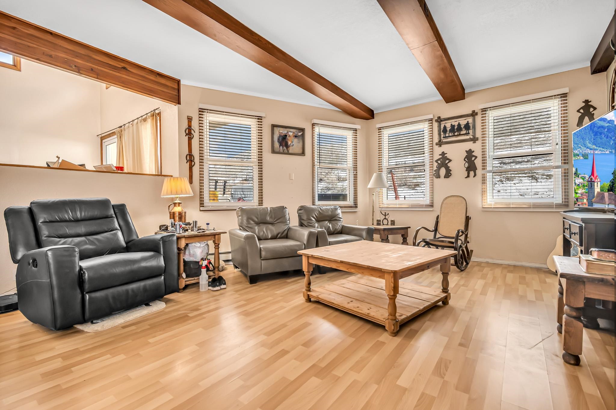 3553 1/2 E Road Palisade, CO 81526 - Photo 15 of 16 a living room with furniture and a large window